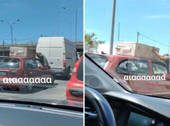 Μεταφορά ψυγείου, χωρίς να είναι δεμένο – Αντί για σχοινί το κρατάει συνοδηγός κρεμασμένος από το παράθυρο!